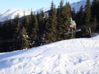 Mid-air snowboarding jump